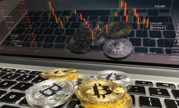 Bitcoins on a laptop.
